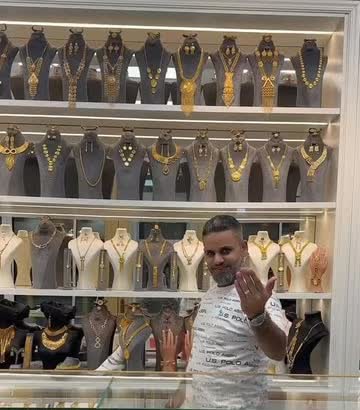 The wall of gold necklaces behind the counter at Al Akaber Jewelry, 11228 S Harlem Ave